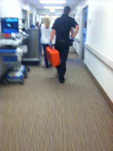 paramedic-walking-through-hallway